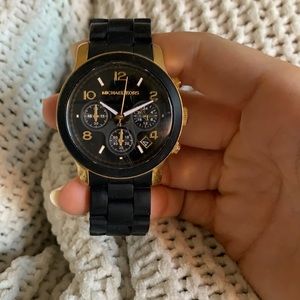 Black and gold watch